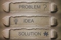 Problem, idea, solution on torn paper.