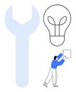 Creative problem-solving concept with a wrench, lightbulb, and a person holding a cube Royalty Free Stock Photo