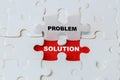 problem solving. lifted puzzle piece with the word Problem reveals the Solution symbol. Conceptual photo. closeup Royalty Free Stock Photo