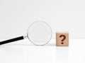 Problem, uncertainty and confusion. Searching for an answer. Problem analysis and solution. Wooden cube with question mark symbol Royalty Free Stock Photo