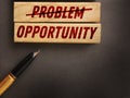 Problems crossed out and opportunity on wooden blocks. Business startup concept Royalty Free Stock Photo