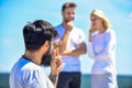 Problems in relationships. interpersonal relationship. conversation behind. couple in love. third wheel man Royalty Free Stock Photo