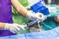 The procedure of inserting a double lumen catheter into a patient with cardiovascular occlusion in the hospital. Doctor insert Royalty Free Stock Photo