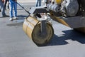 A procedure for installing asphalt on roads using asphalt special machines as well as heavy vibration roller pavements