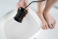 procedure of ionic detox foot bath machine in spa beauty center Royalty Free Stock Photo