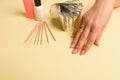 The procedure for removing varnish from nails hybrid nails in progress. Gel nail polish remover foils on woman& x27;s hands Royalty Free Stock Photo