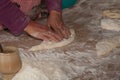 The process of baking bread in a traditional Georgian stove - to Royalty Free Stock Photo