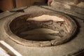 The process of baking bread in a traditional Georgian stove - to Royalty Free Stock Photo