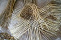 Process of basket weaving made of bamboo strips.