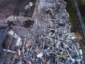 A process of buliding demolition, demolished house, shot from air with drone