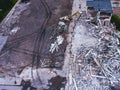 A process of buliding demolition, demolished house, shot from air with drone