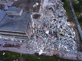 A process of buliding destruction, demolished house, shot from air with drone
