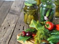 The process of canning cucumbers in glass jars under lids for storage for the winter.Ingredients for pickling cucumbers on a