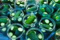 The process of canning pickled gherkins for the winter, pickles cucumbers in glass jars
