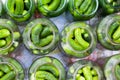 The process of canning pickled gherkins for the winter, pickles cucumbers in glass jars
