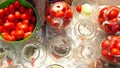 The process of canning pickles tomatoes in jars making salted tomatoes