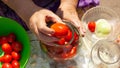 The process of canning pickles tomatoes.put tomatoes in a jar