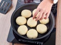 The process of chef cooking pan-fried bun Royalty Free Stock Photo