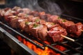 process of churrasco skewering by the grill