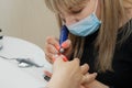 The process of cleaning the nail from the old coating, alignment and giving it the desired shape