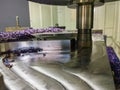 A process of cnc milling of lagre thick steel palte by curved trajectory, Selective focus with blur technique Royalty Free Stock Photo