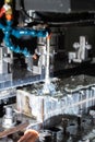 A process of cnc vertical reaming with liquid coolant flow Royalty Free Stock Photo