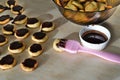 Process of coating curd biscuits with chocolate icing