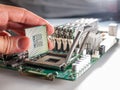 The process of connecting the CPU to the processor socket on a modern computer motherboard, replacing the silicon data processing Royalty Free Stock Photo