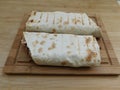 The process of cooking chicken wrap on kitchen table at home concept. Homemade kebab close up Royalty Free Stock Photo