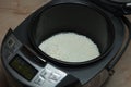 The process of cooking rice porridge in multicooker closeup Royalty Free Stock Photo