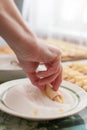 Process of cooking small croissants with cerry for breakfast. Preparation of baking. Breaded with sugar.