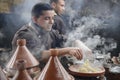 The process of cooking traditional Moroccan tajin dish