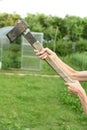 The process of cutting wood with a cleaver. Man is holding an axe Royalty Free Stock Photo