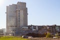 process of destruction of the building due to dilapidation and widening of the road. Destroyed multi-storey building Royalty Free Stock Photo