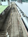 The process of dismantling and replacing sleepers on a local railroad in Medan city, taken from high