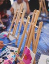 Process of drawing, group class of talented students with painting easels and canvases during lesson of watercolour painting Royalty Free Stock Photo