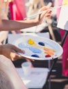 Process of drawing, group class of talented students with painting easels and canvases during lesson of watercolour painting Royalty Free Stock Photo