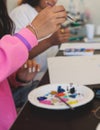 Process of drawing, group class of talented students with painting easels and canvases during lesson of watercolour painting Royalty Free Stock Photo