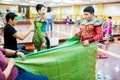 The process of dressing the Thai pantomime for the actors with hand sewing, repairing