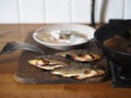 The process of frying river fish crucian carp, previously boned in flour, in a frying pan on a stove.River fish of the rivers of Royalty Free Stock Photo