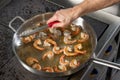 the process of frying shrimp in a frying pan Royalty Free Stock Photo