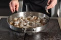 the process of frying shrimp in a frying pan Royalty Free Stock Photo