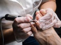 The process of hardware pedicure. Close up. Royalty Free Stock Photo