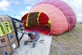 The process of inflating balloons with a gasoline fan and a gas burner Royalty Free Stock Photo