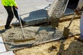 Construction of new sidewalks laying concrete cement Royalty Free Stock Photo