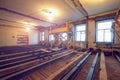 The process of installing new floor from double-tee girder and wooden joist in huge room in apartment that is under Royalty Free Stock Photo