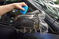 The process of installing PPF on the side mirror. Car wrapping close-up. Car wrapping. Royalty Free Stock Photo
