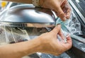 The process of installing PPF on the side mirror. Car wrapping. Royalty Free Stock Photo