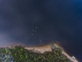 A process of kayaking in the lake skerries, with canoe kayak boat, process of canoeing, aerial shot from drone