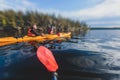 A process of kayaking in the lake skerries, with canoe kayak boat, process of canoeing, aerial shot from drone